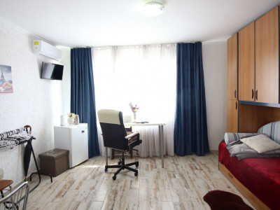 Piata Victoriei - Guvern, garsoniera cocheta, mobilata/ utilata, etaj 4/8